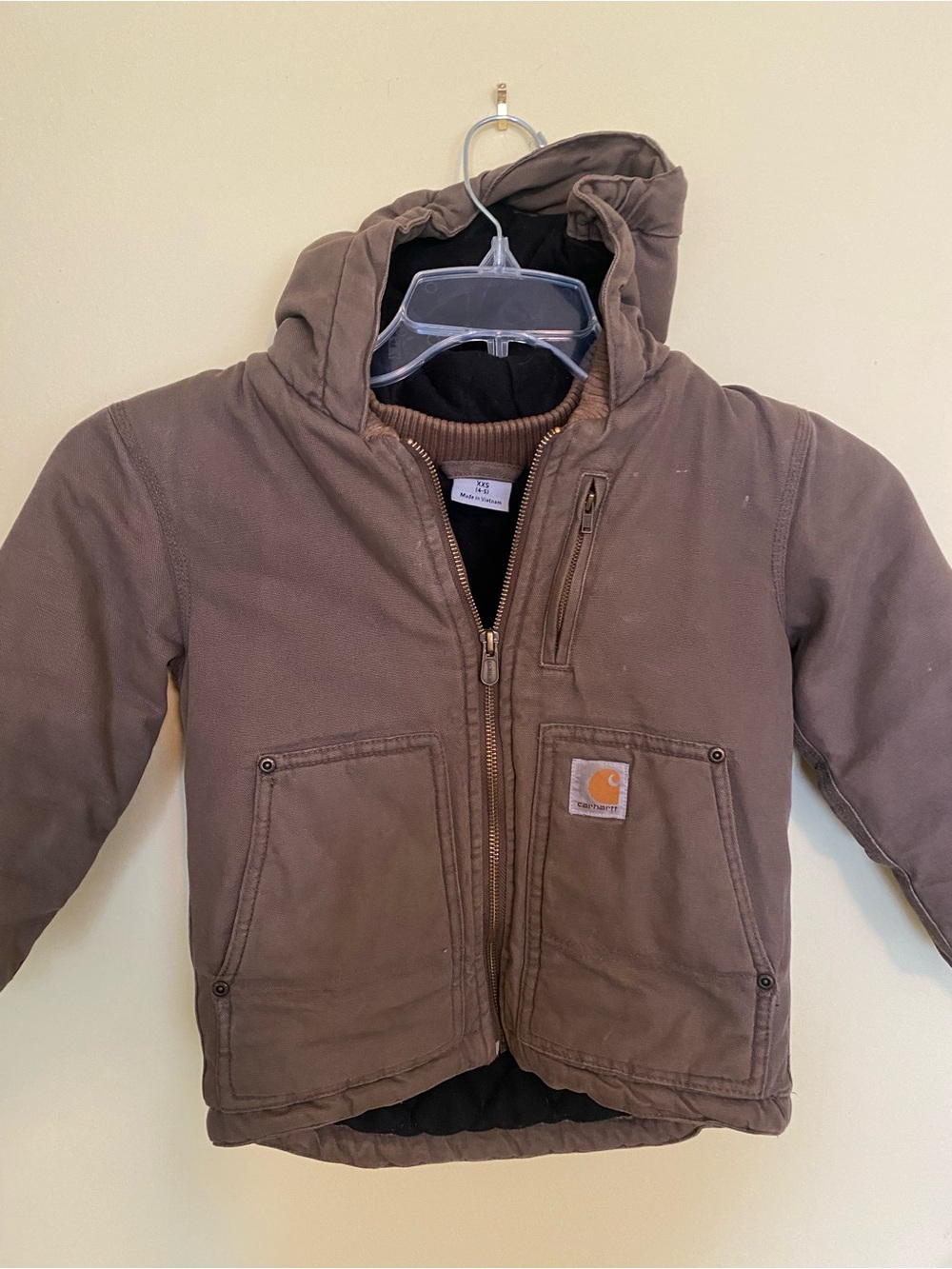 Kids Carhartt Brown Zip-Up Hooded Jacket with Gold Logo.